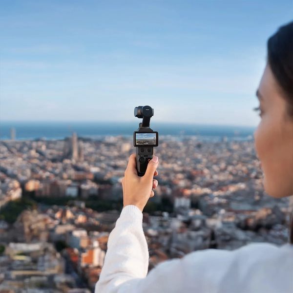 Екш-камера DJI Osmo Pocket 4 Creator Combo